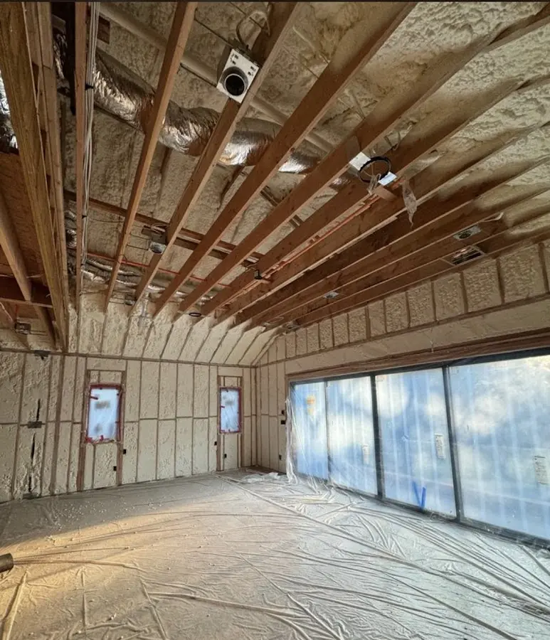 Interior walls and ceiling insulated with spray foam during new construction in Pekin